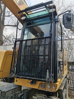 Kolové rypadlo CAT M314 F - 9