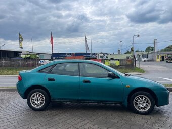 Mazda 323f 1.5 66 KW DOHC. Klima, el.okna, ALU kola - 9