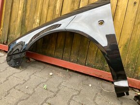 levy i pravy přední blatník Škoda Octavia 1,I,barva 9910 - 9