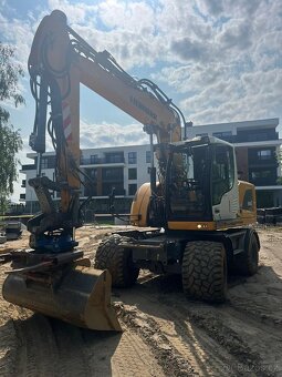 Kolové rypadlo LIEBHERR 914 kolový bagr LIEBHERR A914 - 9