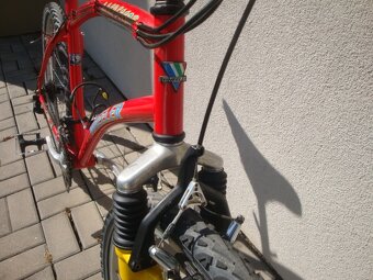 Staré horské kolo Wheeler - shimano Deore LX - 9