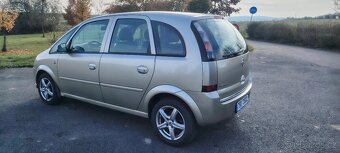 Opel Meriva 1.4i 66Kw benzin, r.v.2010 nová STK,nové pneu - 9