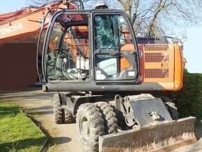 Prodej kolový bagr Hitachi - 9