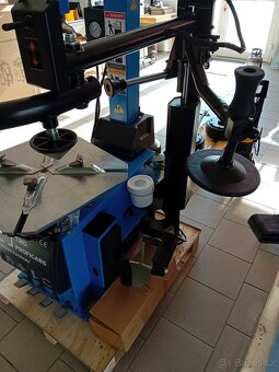 Automatická zouvačka s pomocným ramenem do 26 palců - 9