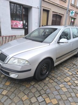 Škoda Octavia 2 rok 2005 77 kW km 384 - 9