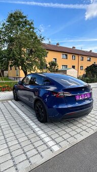 Tesla y - 9