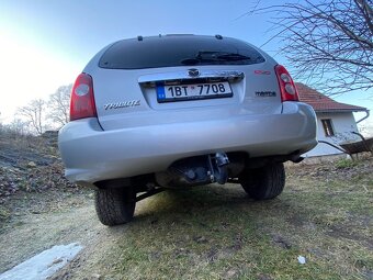 Mazda Tribute 2,3 - 9