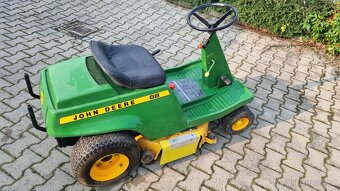 Rider John Deere 68 - 9