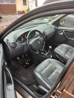 Dacia Duster 1.6i 77kw Prestige - 9