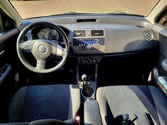 Suzuki Swift 1.3i - 9