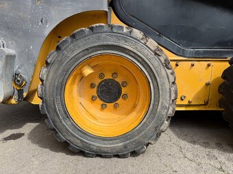 Kolový nakladač KOMATSU SK714 - 9
