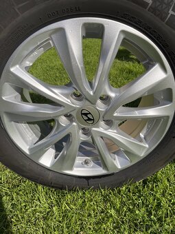 Sada ALU kola 6.5JX16 5X114.3 ET50 R16 + pneu zimní 205/60 - 9