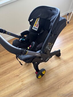 Autosedačka s kolečky - Doona i - 9