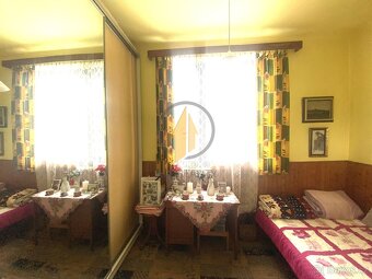 Prodej rodinného domu 7+1 s výhledem na Trosky se zahradou a - 9