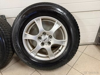 Zimní sada Suzuki Grand Vitara 2 215/70 R16, 5x114,3 - 9