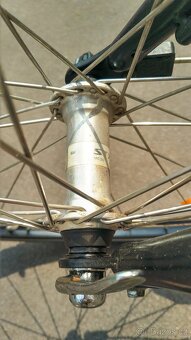 Kvalitní městské kolo Ruhrwerk Shimano Deore - 9