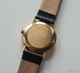Pánské zlaté náramkové hodinky Omega 18K - 9