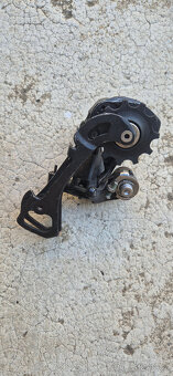Přehazovače a páčky Sram, Shimano - 9