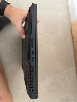 Herní notebook MSI GL75 9SE + chladící podložka GT500 + bato - 9