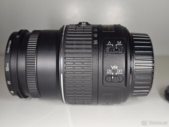 Nikon AF-S DX NIKKOR 18-55mm f/3.5-5.6G VR II + filtr - 9