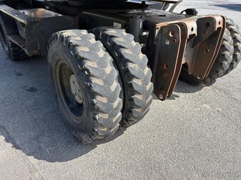 Kolové rypadlo / nakladač New Holland MH CITY - 9