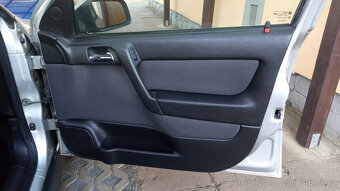 Opel Astra G 1.8i - 9