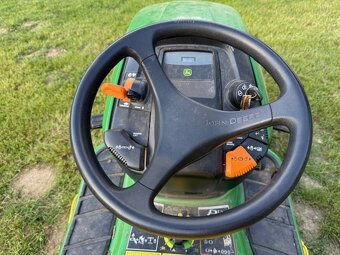John Deere X 304 - 9