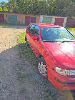 Nissan Almera 1.4 16V Spring hatchback garazovany - 9