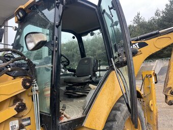 CATERPILLAR 428 E 4X4 - 9