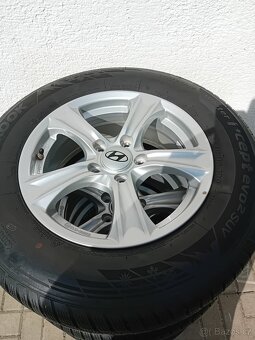 Alu kola Hyundai 5x114,3R16 - 215/70R16 - 9