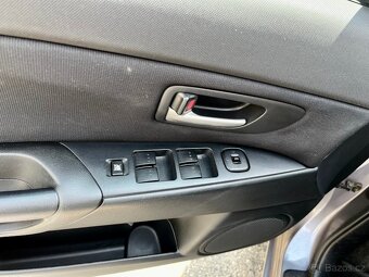 Mazda 3 1,4 - 9