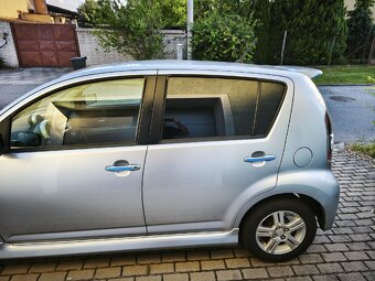 Daihatsu sirion 1,3i 64 kw - 9