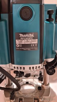 Horní frézka s regulací Makita RP2303FCX 2100W - 9