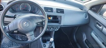 Suzuki Swift 1.3 - 9