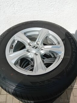 Alu kola Hyundai 5x114,3R16 - 215/60R16 - 9
