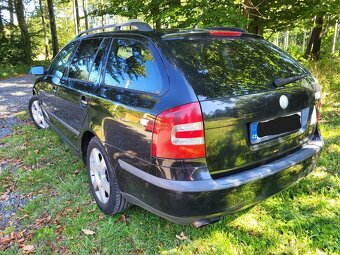Škoda octavia2 2.0 TDI rok 2008,103KW + plechová zimní kola - 9