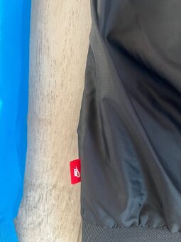 Dámská větrovka Nike Windrunner vel.L - 9