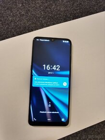 Mobilní telefon Alcatel - 9