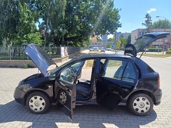 Škoda Fabia 1.2i 40kw benzin r.2004 stk platná - 9