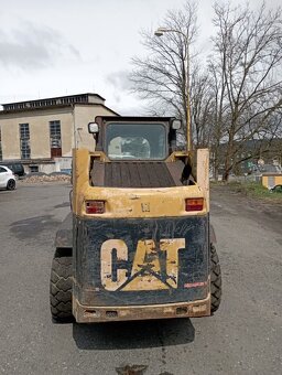 CAT 242 - 9