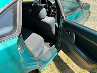 Mazda 323F BA 1.8 - 9