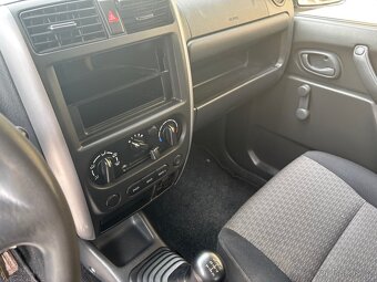 Suzuki Jimny 4x4 - rok2008,najeto101578KM,1.3benzín,62kw - 9