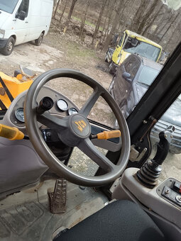 Kolový nakladač JCB 407 Kolový nakladač JCB 407 - - 9