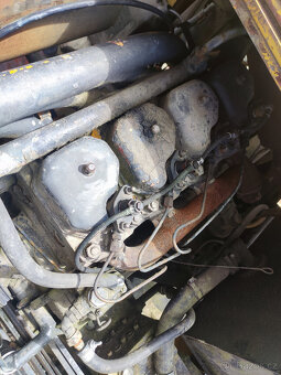 Kolový bagr DH 113 - 9