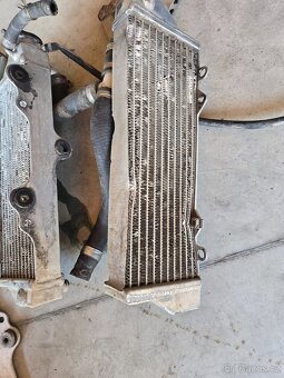 Chladiče a držáky Husqvarna 125 - 9