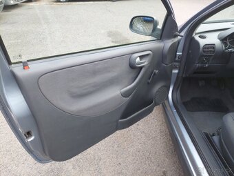 Opel Corsa 1.2i - 9