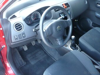 Suzuki Swift 1.3 i - 9
