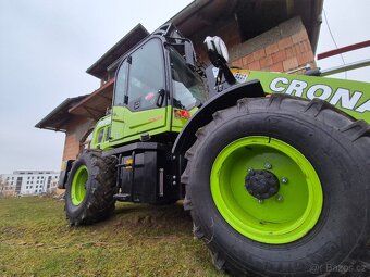 Nádherný nakladač 4x4 .vytápění. - 9