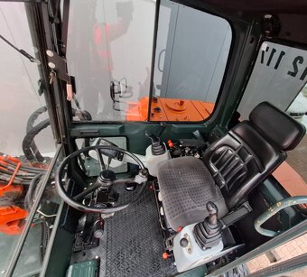 Prodám kolový bagr Yanmar B50W - 9