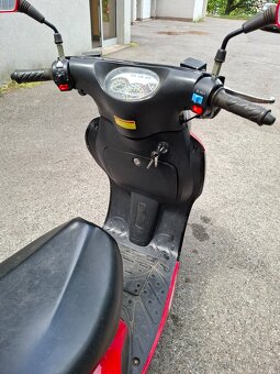 Skútr 125 - 9